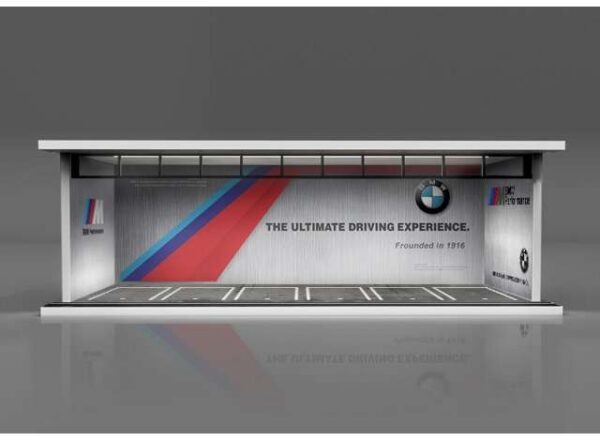 Parkovací garáž *BMW se světlem* v měřítku 1/64, modrá/červená/šedá.